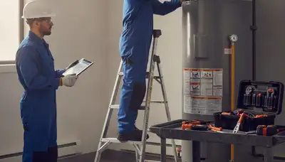 Charleston, SC plumber repairing a water heater for a residential emergency service call